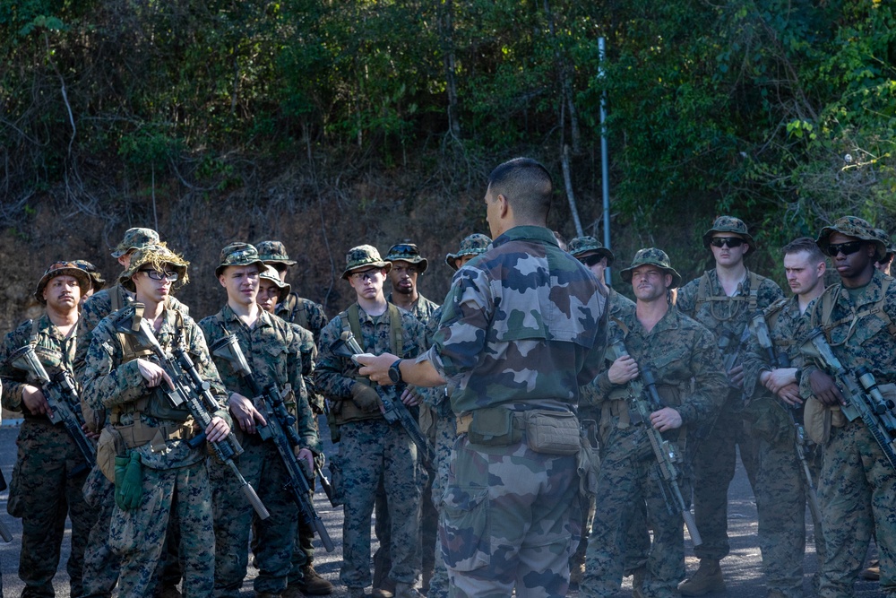 Multinational forces participate in jungle patrol training during TRADEWINDS 25