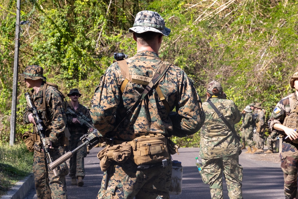 Multinational forces participate in jungle patrol training during TRADEWINDS 25