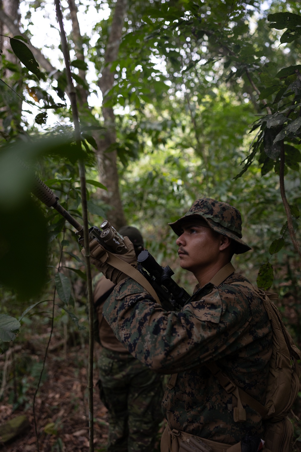 Multinational forces participate in jungle patrol training during TRADEWINDS 25