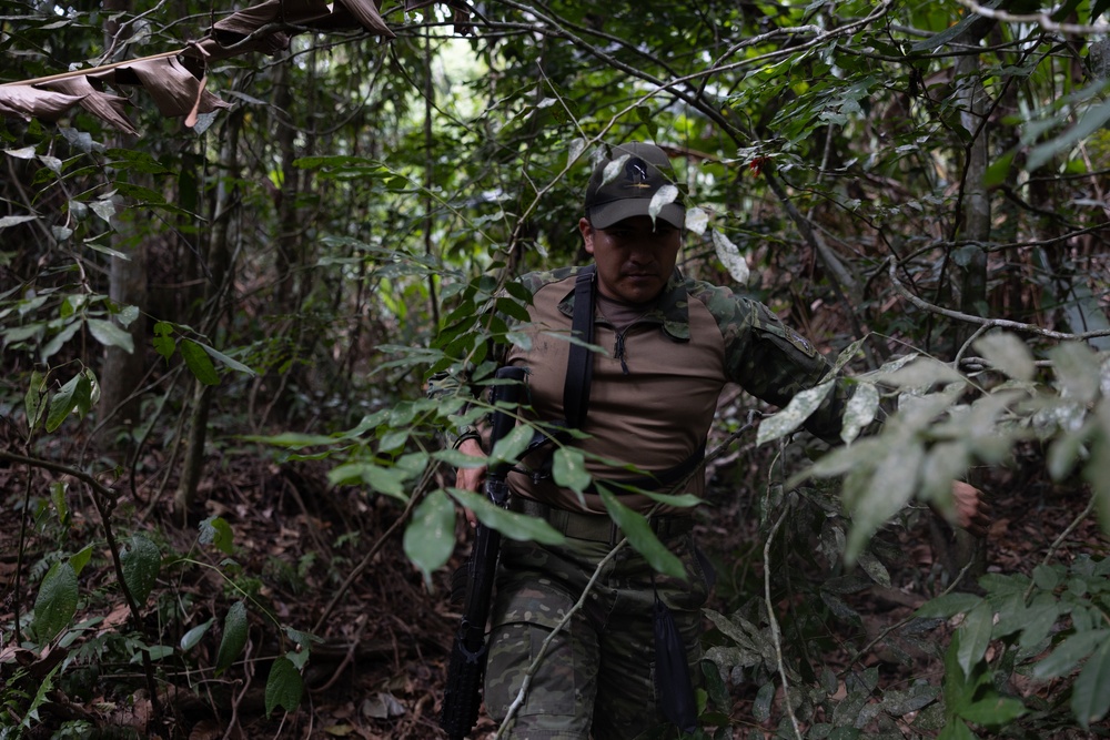 Multinational forces participate in jungle patrol training during TRADEWINDS 25