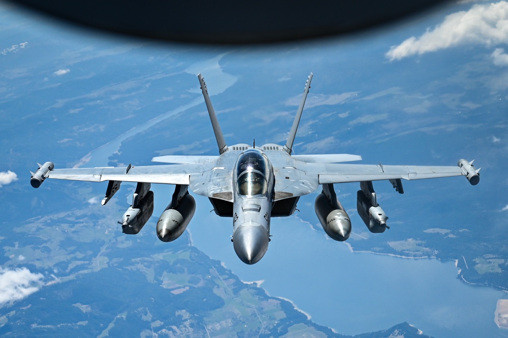 KC-135 Stratotanker refuels EA-18G Growlers