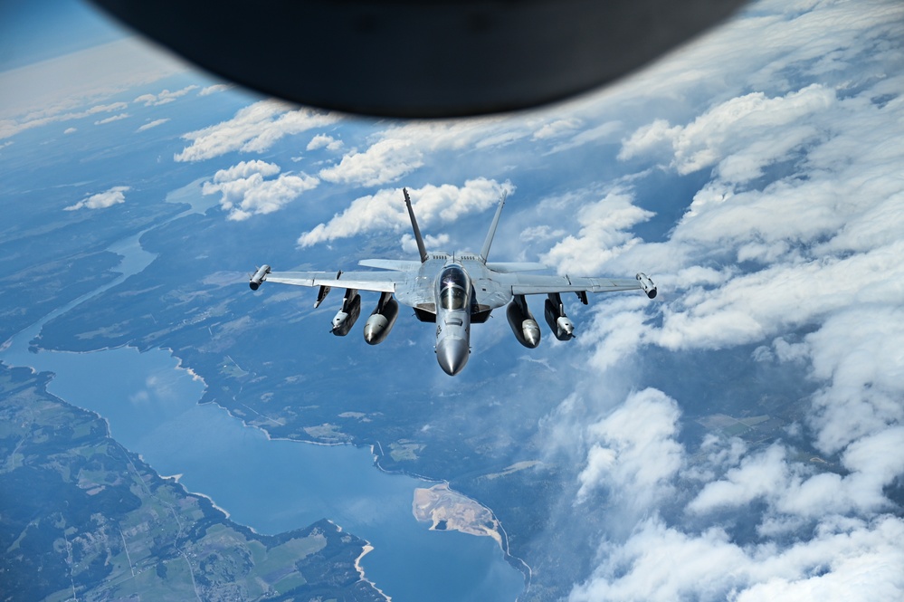 KC-135 Stratotanker refuels EA-18G Growlers