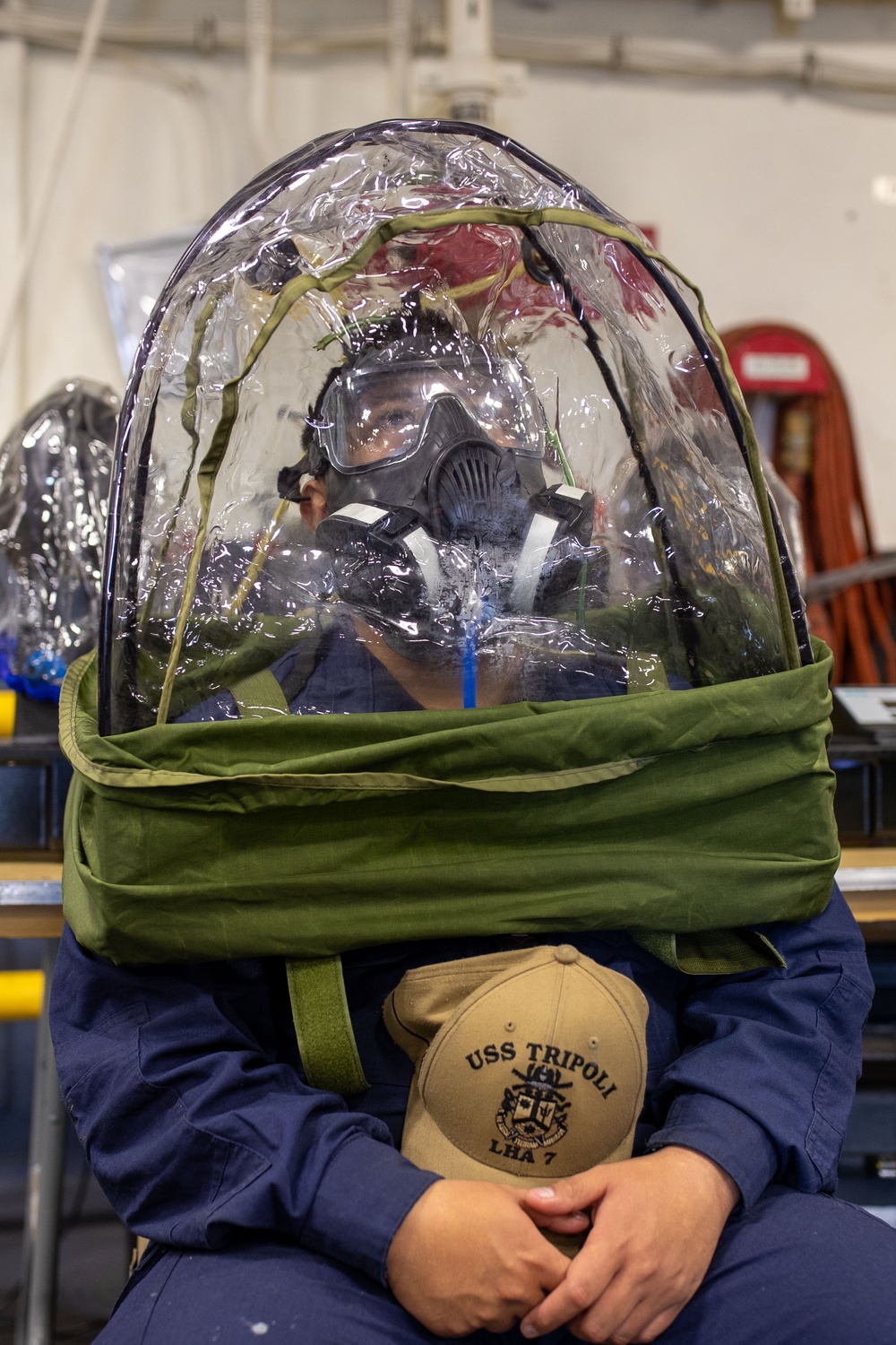 USS Tripoli Sailors Get CBR M50 Masks Fitted