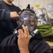 USS Tripoli Sailors Get CBR M50 Masks Fitted