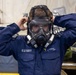 USS Tripoli Sailors Get CBR M50 Masks Fitted
