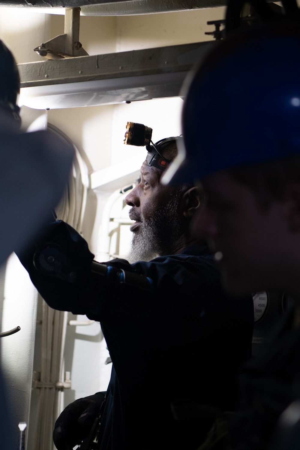 USS Ronald Reagan (CVN 76) Sailors and Puget Sound Naval Shipyard workers collaborate together