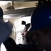 USS Ronald Reagan (CVN 76) Sailors and Puget Sound Naval Shipyard workers collaborate together
