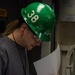 USS Ronald Reagan (CVN 76) Sailors and Puget Sound Naval Shipyard workers collaborate together