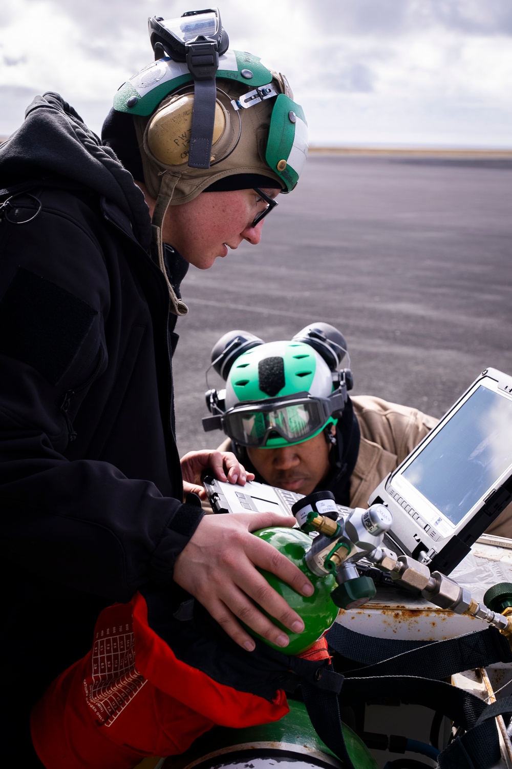 Sailor Fills Portable O2 Bottle