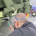 LRC Benelux autobody tech transforms APS-2 gear from tan to green on Army’s 250th
