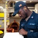 Gas Turbine Systems Technician (Mechanical) 3rd Class Gregory Sudue reviews maintenance procedures