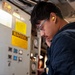 Gas Turbine Systems Technician (Mechanical) Fireman Daniel  Martinez reviews maintenance procedures