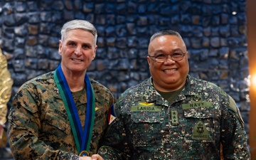 The Assistant Commandant of the Marine Corps tours the Philippines