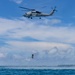 Search and Rescue Swimmers from HSM 49 det. 4 Practice Jumps off the Coast of Diego Garcia