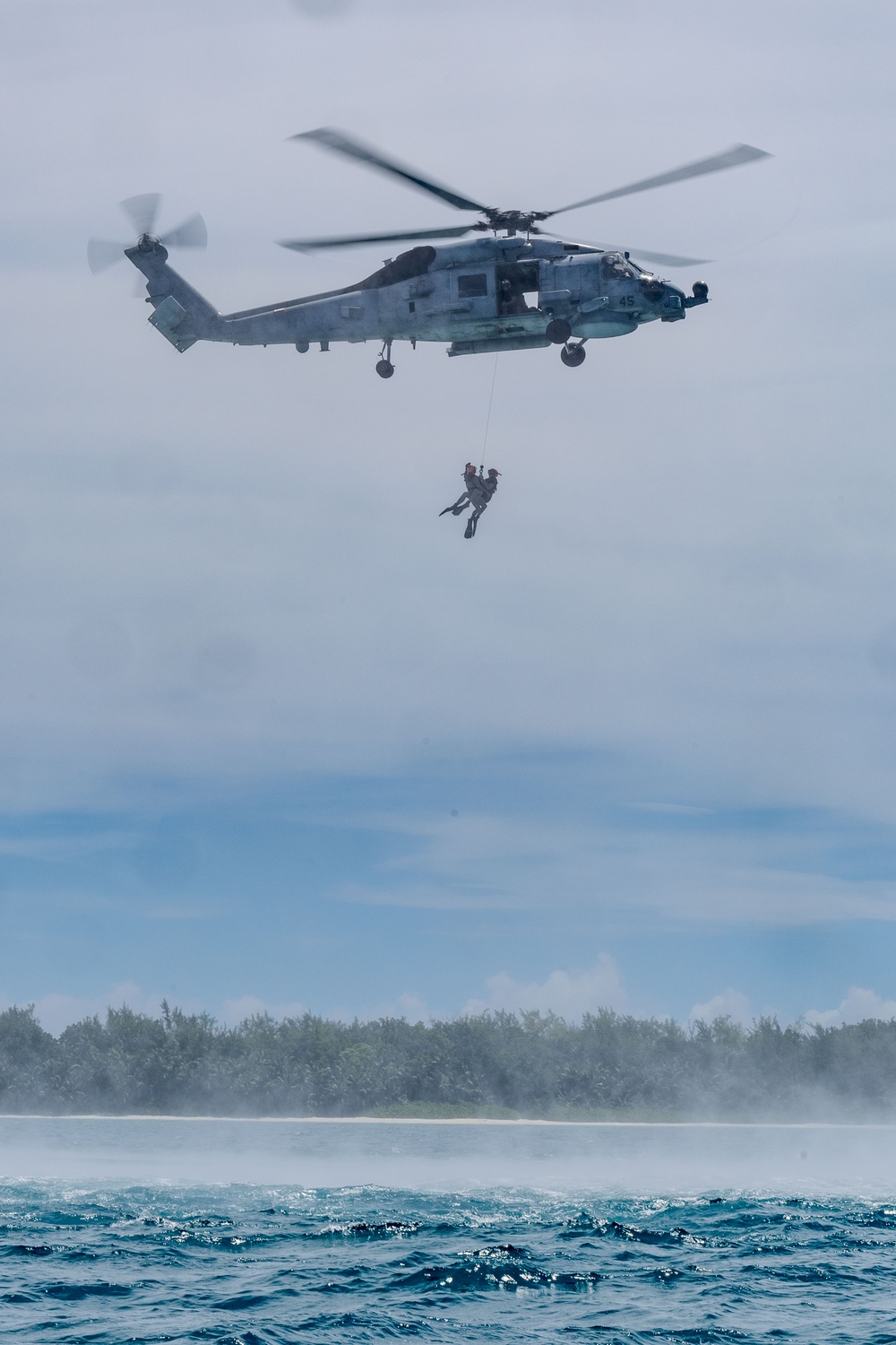 Search and Rescue Swimmers from HSM 49 det. 4 Practice Jumps off the Coast of Diego Garcia