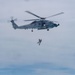 Search and Rescue Swimmers from HSM 49 det. 4 Practice Jumps off the Coast of Diego Garcia