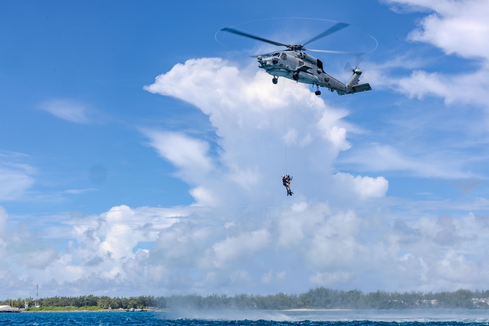 Search and Rescue Swimmers from HSM 49 det. 4 Practice Jumps off the Coast of Diego Garcia