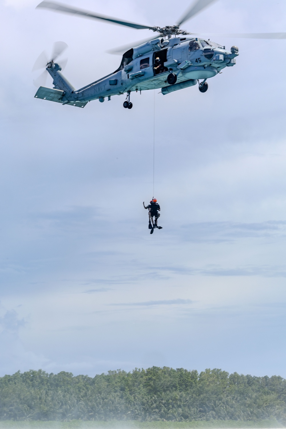 Search and Rescue Swimmers from HSM 49 det. 4 Practice Jumps off the Coast of Diego Garcia