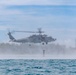 Search and Rescue Swimmers from HSM 49 det. 4 Practice Jumps off the Coast of Diego Garcia