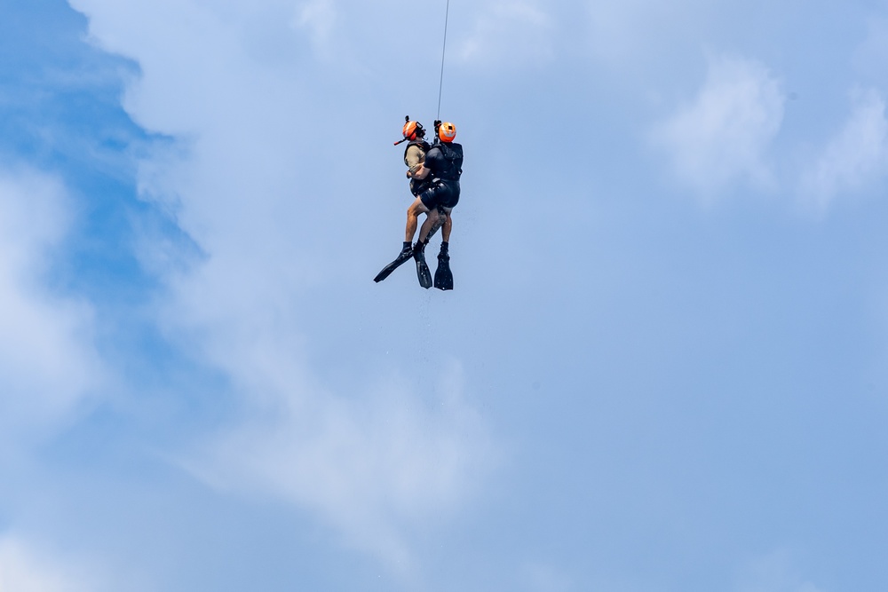 Search and Rescue Swimmers from HSM 49 det. 4 Practice Jumps off the Coast of Diego Garcia