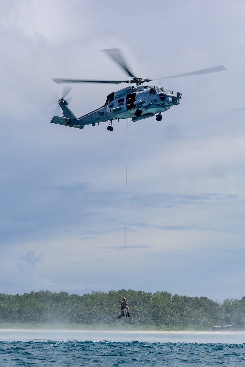 Search and Rescue Swimmers from HSM 49 det. 4 Practice Jumps off the Coast of Diego Garcia