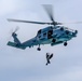 Search and Rescue Swimmers from HSM 49 det. 4 Practice Jumps off the Coast of Diego Garcia