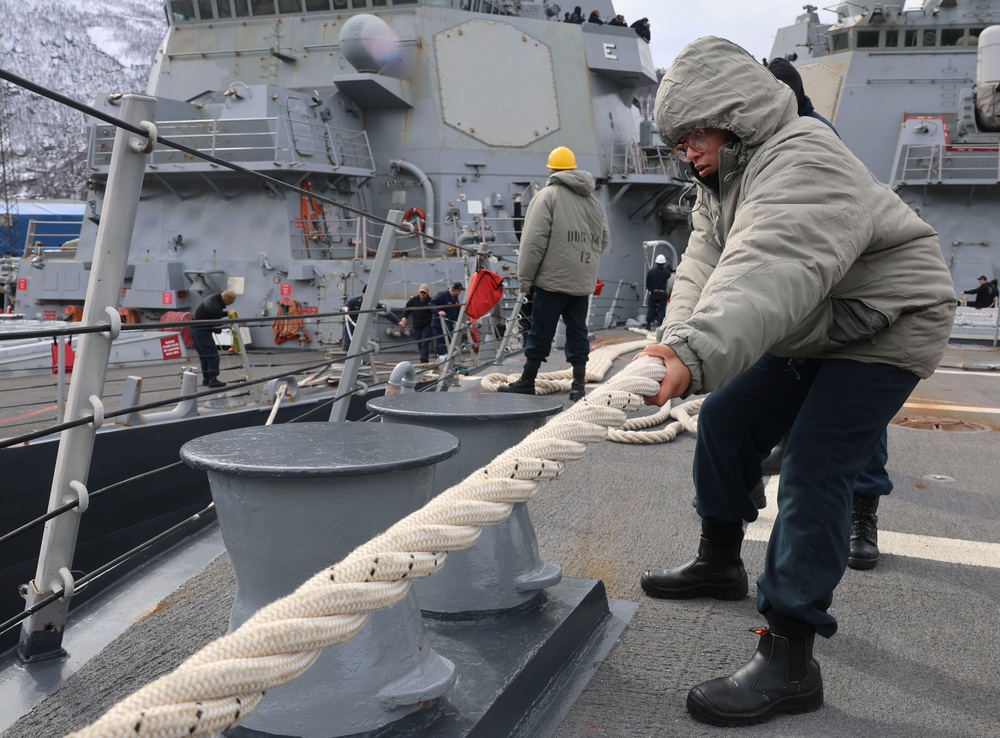 Seaman Niccole Bermundez heaves in a mooring line during a sea-and-anchor detail