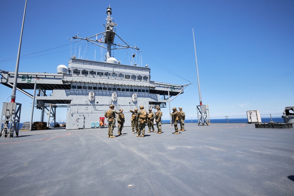 U.S. Marines with FAST Company Europe conduct weapon manipulation drills aboard the USS Mount Whitney