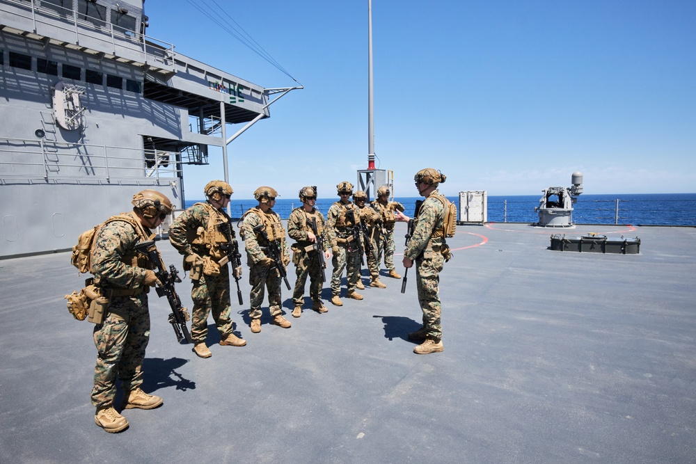 U.S. Marines with FAST Company Europe conduct weapon manipulation drills aboard the USS Mount Whitney