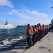 U.S. Navy Sailors observe HDMS Iver Huitfeldt (F361) a Royal Danish Navy Iver Huitfeldt-class frigate