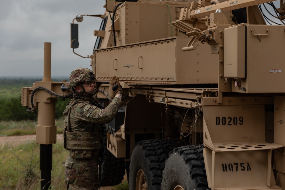 U.S. Soldiers operates detection system