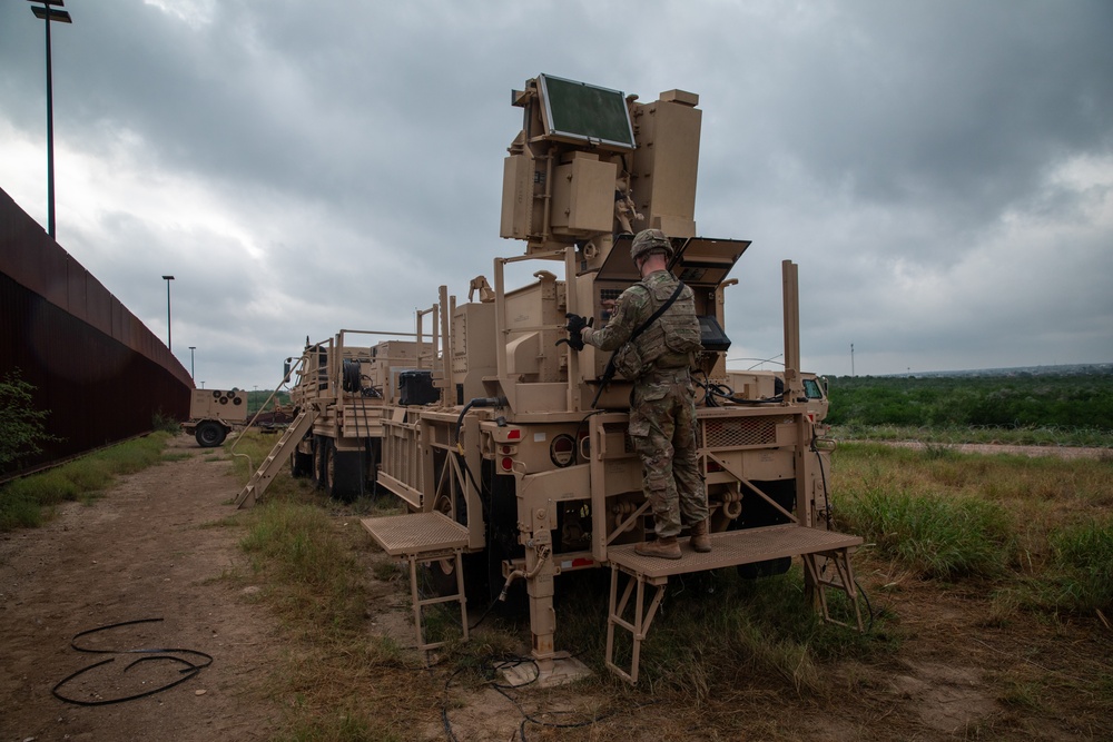 U.S. Soldiers operates detection system