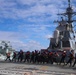 U.S. Navy Sailors heave in the phone and distance (P&amp;D) line from the Royal Canadian Navy replenishment oiler MV Asterix
