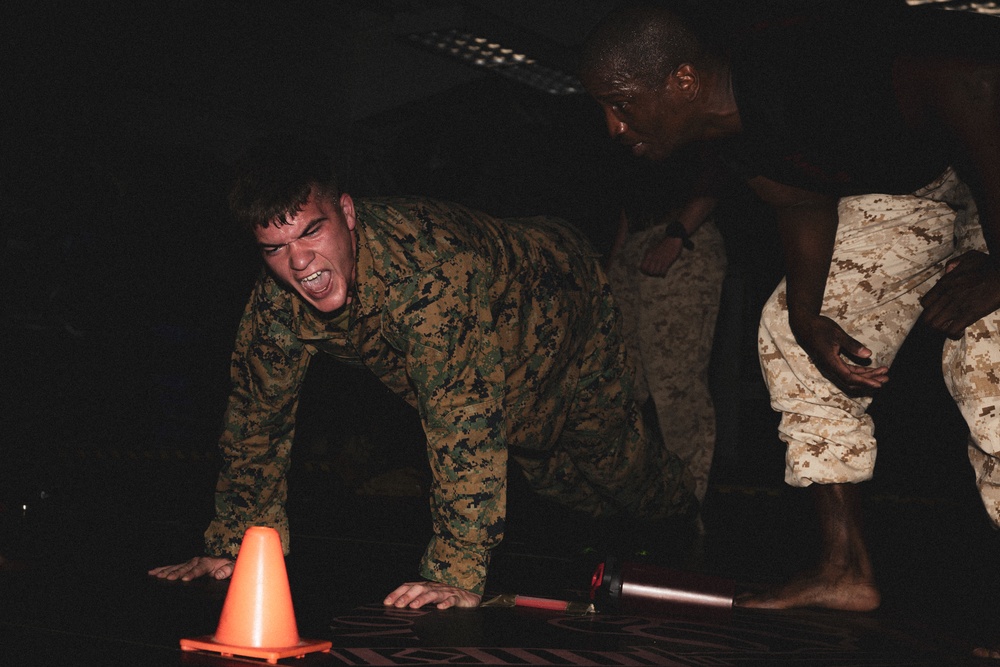 Marines fight in the dark during Martial Arts Instructor Course