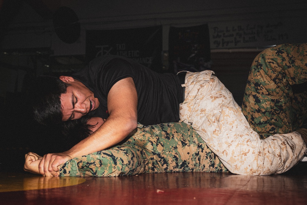 Marines fight in the dark during Martial Arts Instructor Course