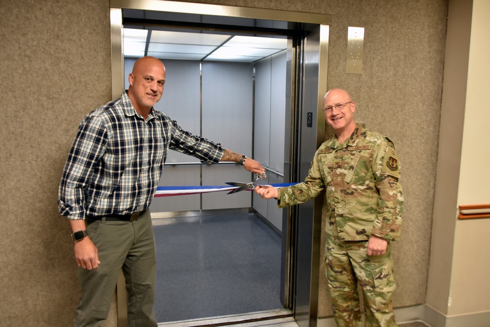 AEDC team members mark elevator replacement with ribbon cutting ceremony
