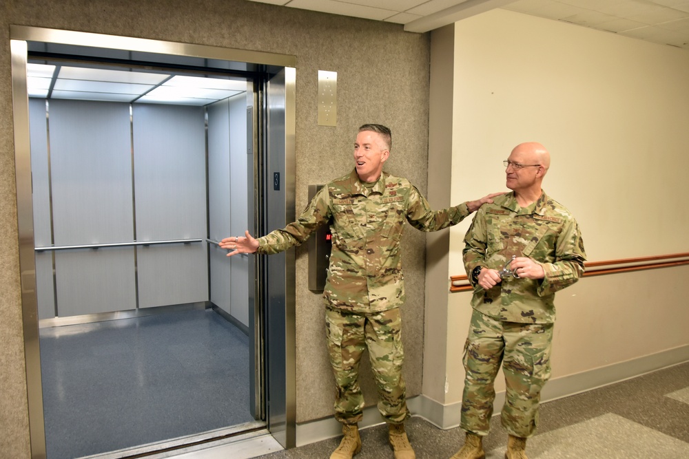 AEDC team members mark elevator replacement with ribbon cutting ceremony