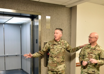 AEDC team members mark elevator replacement with ribbon cutting ceremony