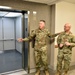 AEDC team members mark elevator replacement with ribbon cutting ceremony