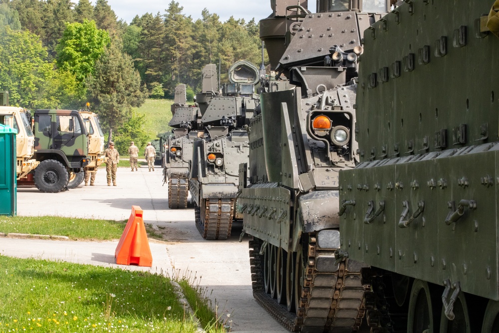 3rd Infantry Division Soldiers install MILES gear on M2A4 Bradleys during Combined Resolve 25-02