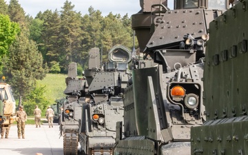 3rd Infantry Division Soldiers install MILES gear on M2A4 Bradleys during Combined Resolve 25-02