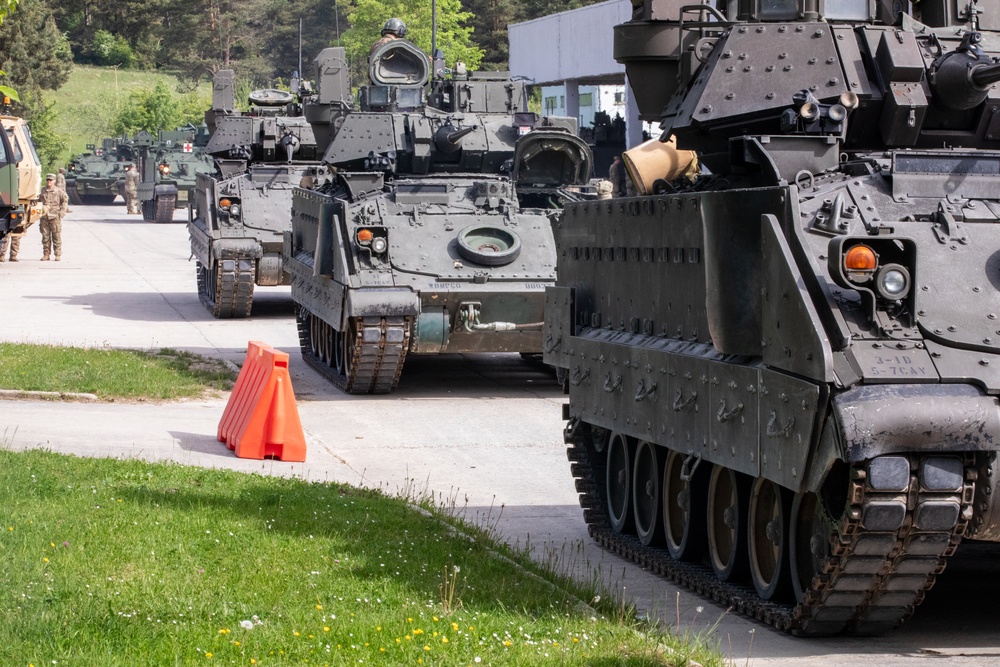 3rd Infantry Division Soldiers install MILES gear on M2A4 Bradleys during Combined Resolve 25-02