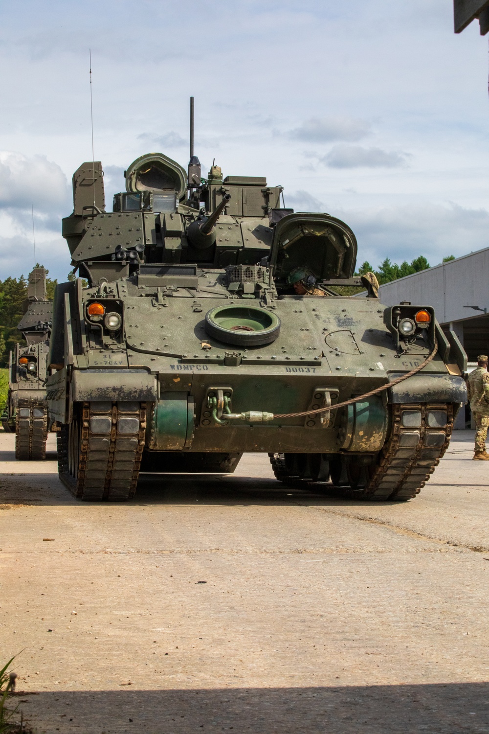 3rd Infantry Division Soldiers install MILES gear on M2A4 Bradleys during Combined Resolve 25-02