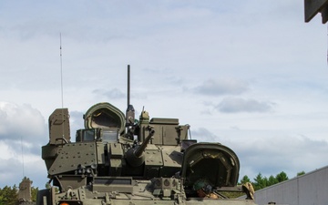 3rd Infantry Division Soldiers install MILES gear on M2A4 Bradleys during Combined Resolve 25-02