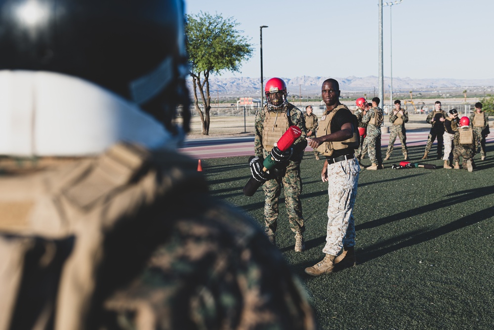 Presicion and Power: Marines fight with pugil sticks during MAIC 73-25