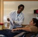USS Ronald Reagan (CVN 76) Sailors donate to blood drive