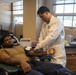 USS Ronald Reagan (CVN 76) Sailors donate to blood drive