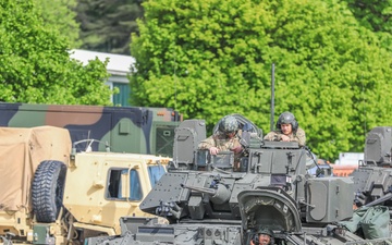 3rd Infantry Division Soldiers and Department of Defense civilian contractors install MILES gear on M2A4 Bradleys during Combined Resolve 25-02