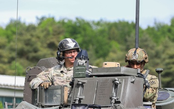 3rd Infantry Division Soldiers and Department of Defense civilian contractors install MILES gear on M2A4 Bradleys during Combined Resolve 25-02
