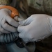 509th OSS AFE flight prepares life support equipment for pilots